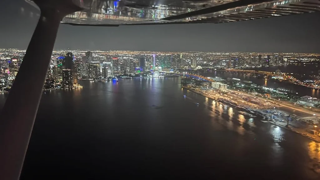 Beautiful sunset over the ocean captured from a private flight tour Miami, perfect for a romantic experience.